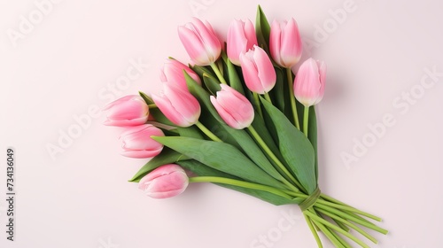 Pink tulip flowers bouquet on white background. Flat lay, top view