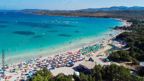 Porto Istana beach - Sassari - Sardinia The bay is a set of four beaches separated by small rocky bands. It is bordered by pink granites and surrounded by the greenery of Mediterranean shrubs. ​