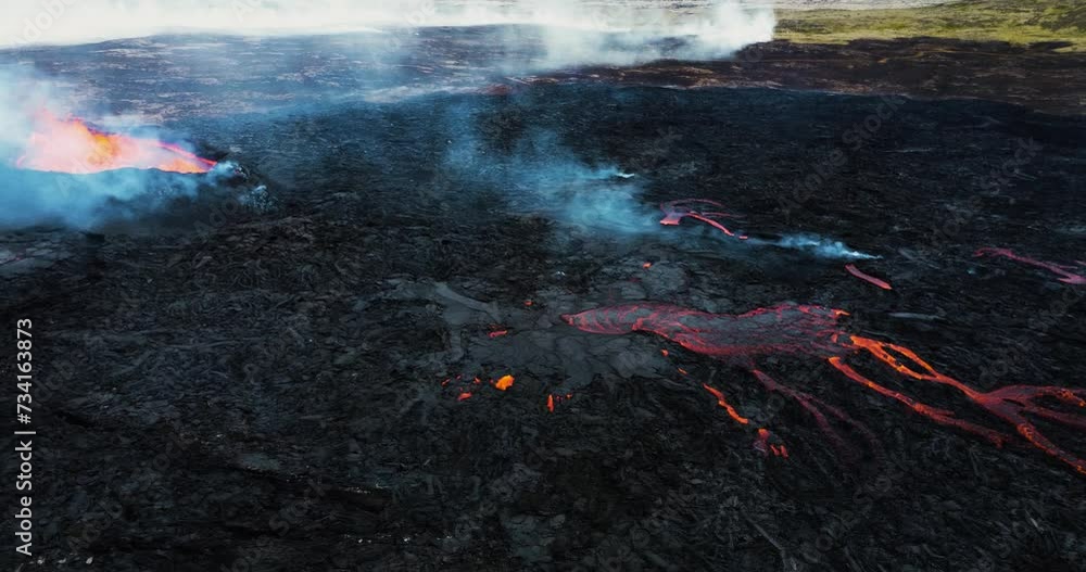 Aerial drone footage of active volcano eruption in Iceland. Hot lava