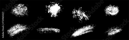 Set of vector white ink brush strokes on black background. White paint, ink brush strokes, lines.Grunge splatter, dirt stain, brush with drops blots