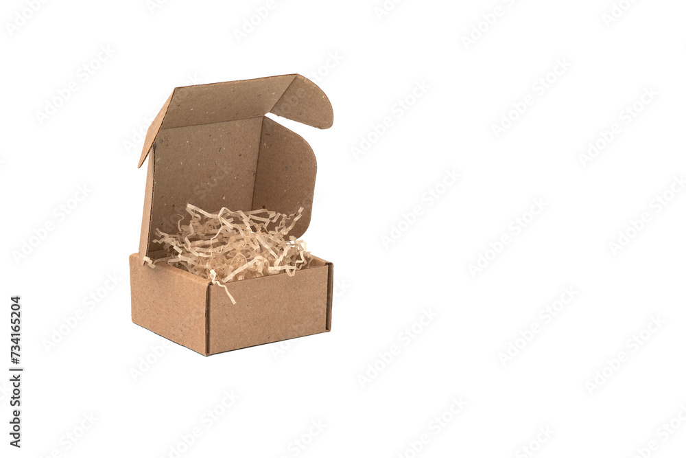 Cardboard box with kraft paper filler. Png. Cardboard box with kraft paper filler. Png.