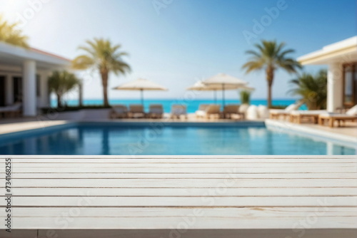 White wooden empty podium, product presentation , visual layout on summer travel hotel swimming pool background. Copy space © irenastar