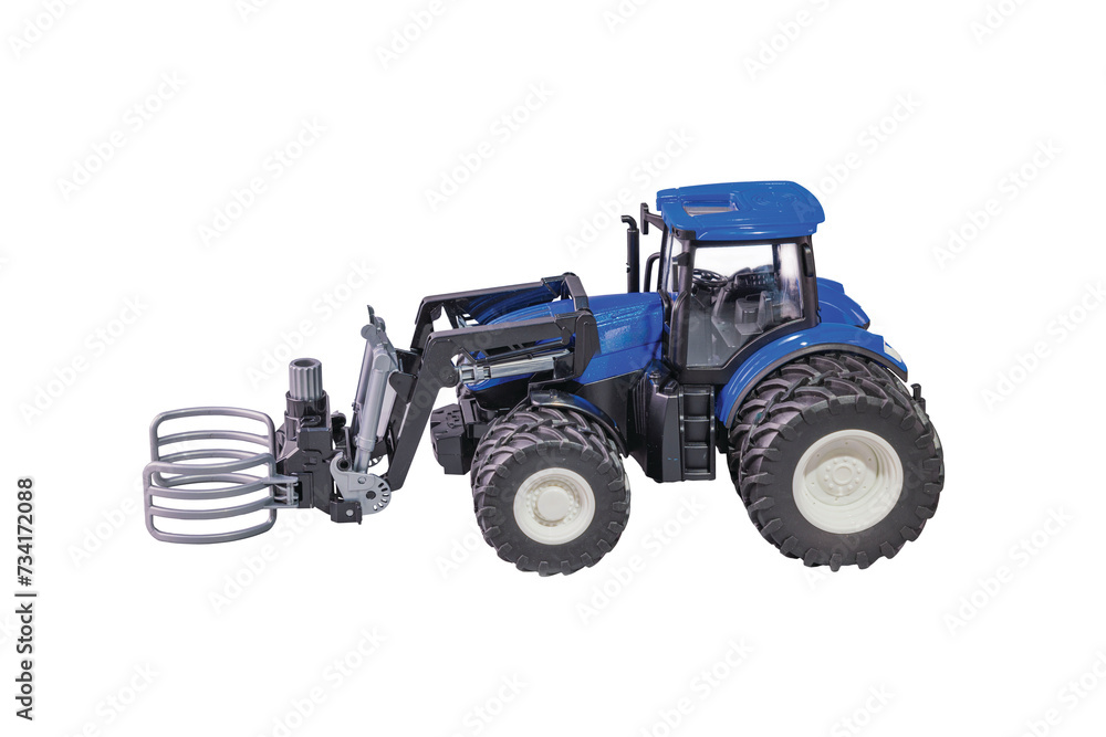 Close-up view of radio-controlled miniature agricultural tractor model isolated on white background. Close-up view of radio-controlled miniature agricultural tractor model isolated on white background.