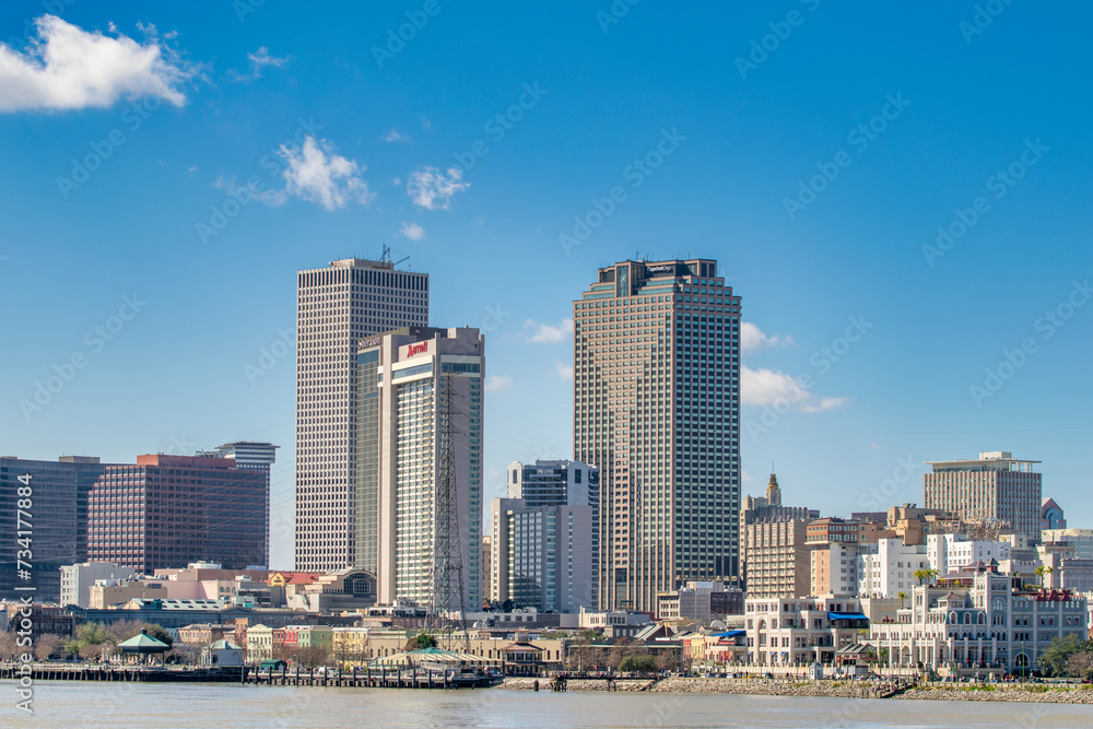 New Orleans, LA - February 11, 2016: City skyline on a sunny day New Orleans, LA - February 11, 2016: City skyline on a sunny day