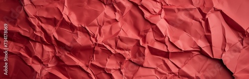 wrinkled red creased paper