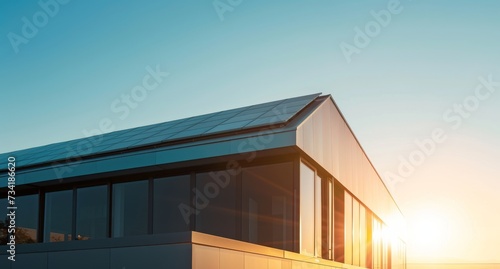 Eco-modern home with solar panels. Green future house  solar panels on eco-friendly dwelling. Sustainable living and renewable clean energy at home.