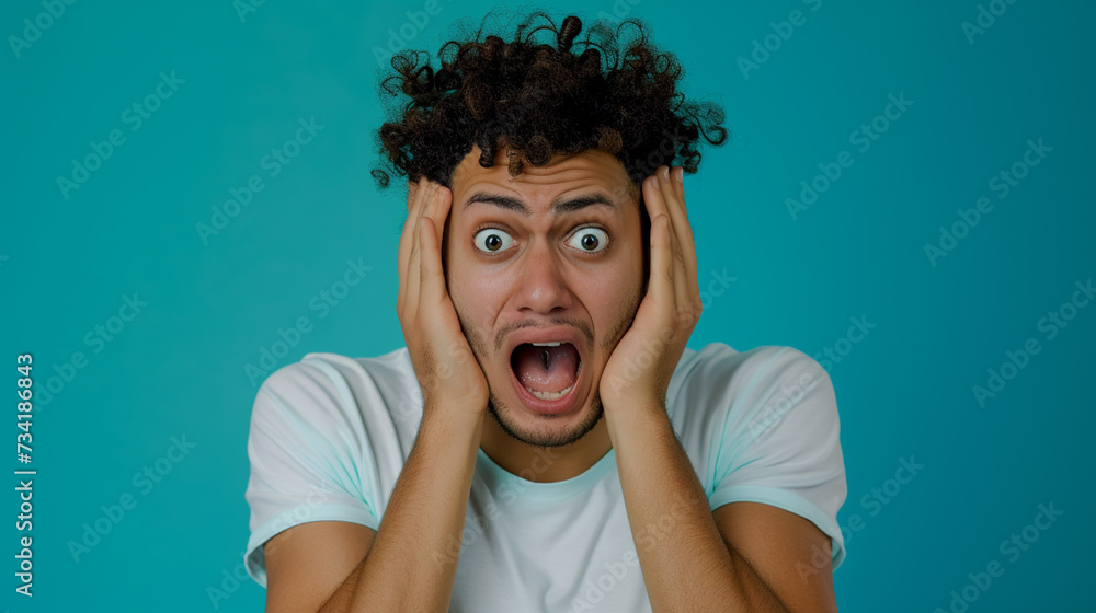 Fearful and Anxious North African Man, Isolated on Solid Background - Copy Space Provided Fearful and Anxious North African Man, Isolated on Solid Background - Copy Space Provided
