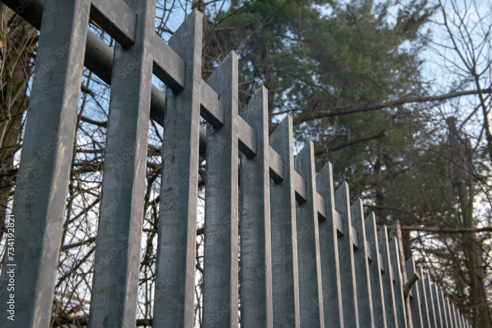 Safe fence with modern railing with linear elements in galvanized steel, security borders, manned and monitored towards any illegal immigrants, irregular immigrants.