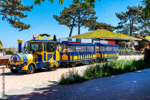 Fototapeta Naklejka Na Ścianę i Meble -  Promenade of Scharbeutz with beach railway, baltic sea, Germany