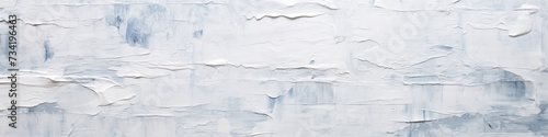 Abstract background based on careless brush strokes of chatel white paint on a blue wall. photo