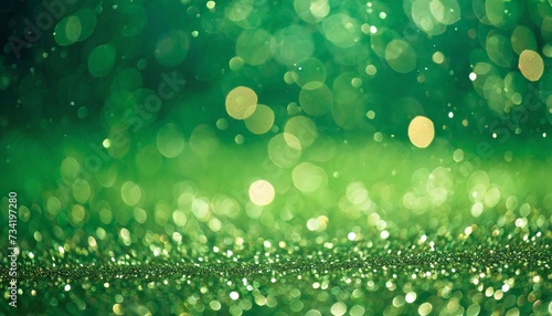 green abstract glitter lights background blurred bokeh