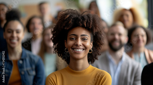 A workshop on diversity and inclusion in the workplace, with a diverse group of employees participating in team-building activities, blurred background, with copy space