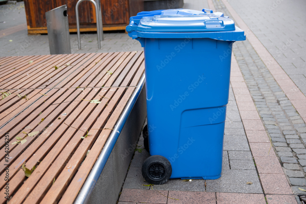 Plastic trash can container stay on the street. Plastic trash can container stay on the street.