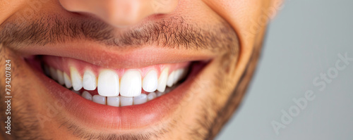 Cheerful Charm: Man's Smiling Face, Teeth Revealed