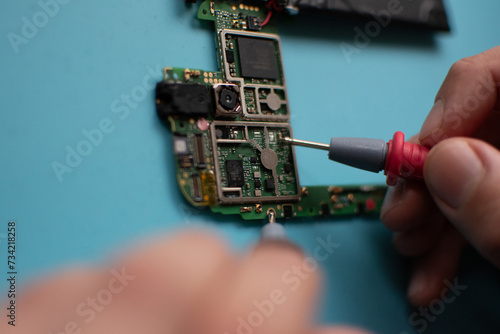 hand holding computer circuit board