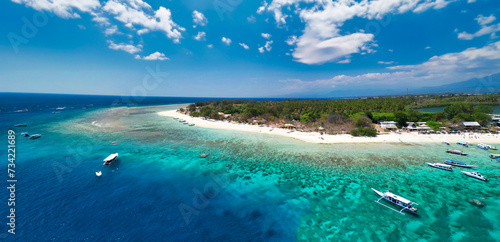 Fototapeta Naklejka Na Ścianę i Meble -  Amazing aerial view of Gili Meno coastline on a sunny day, Indonesia