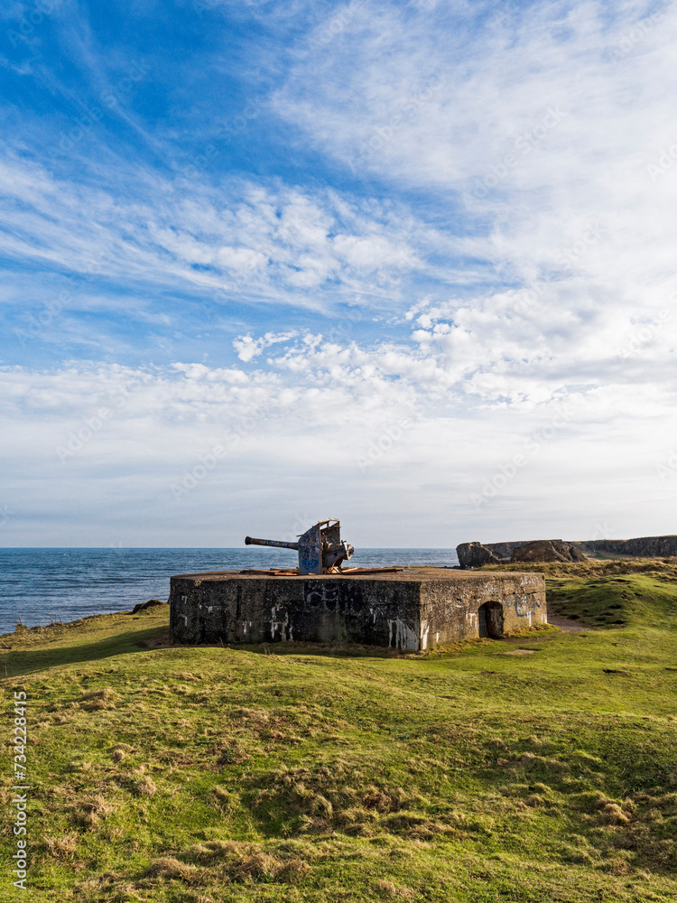 Fototapeta premium Trow Rock disappearing gun replica at South Shields, UK