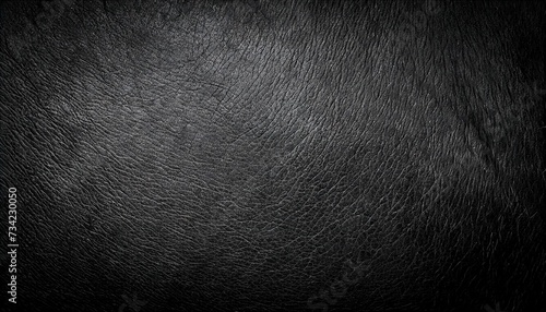 black leather texture genuine reindeer skin close up in black with vignette