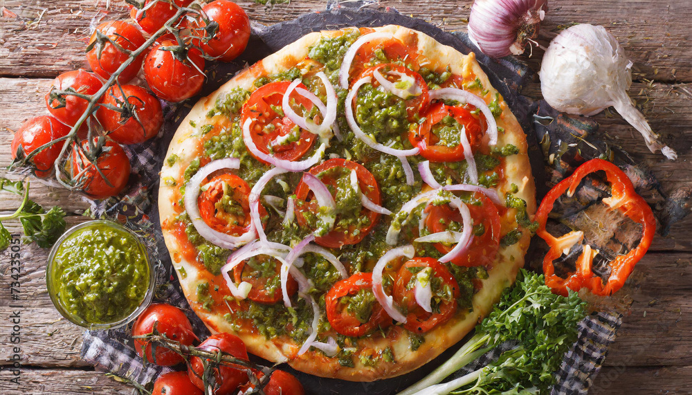 Italian pizza with tomatoes, pepper, onion 