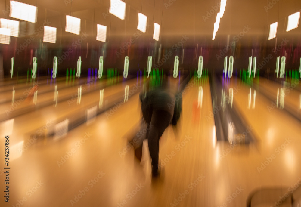 ICM (Intentional camera movement) shots of a person bowling - obrazy, fototapety, plakaty 