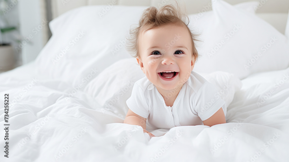 Childcare Concept. Portrait of cute little American baby wearing bodysuit lying on white beedsheets at home. infant child crawling on bed in the bedroom. Selective focus, free copy space Childcare Concept. Portrait of cute little American baby wearing bodysuit lying on white beedsheets at home. infant child crawling on bed in the bedroom. Selective focus, free copy space
