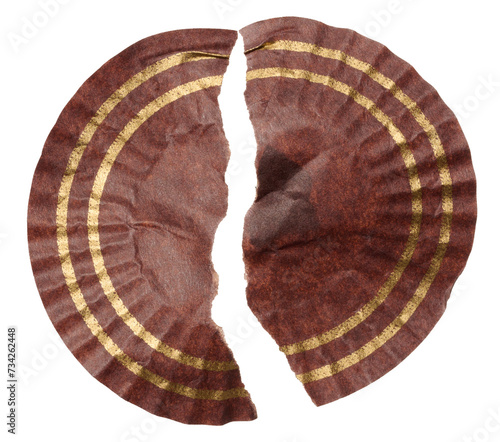 Torn paper round candy wrapper on isolated background photo