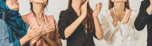 Business people applauding in a business meeting. Conference and presentation award concept. uds