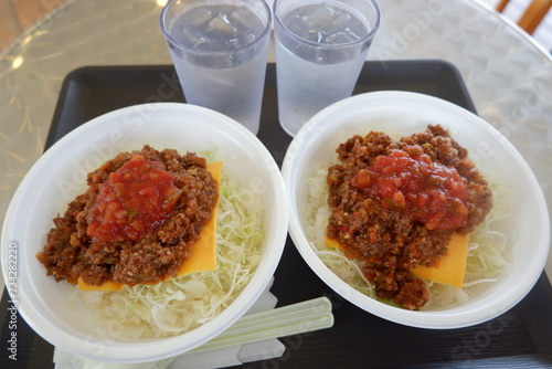 A couple of taco rice and water