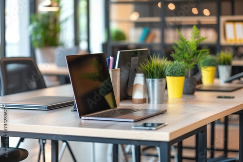 laptop in a warm modern office © StockUp