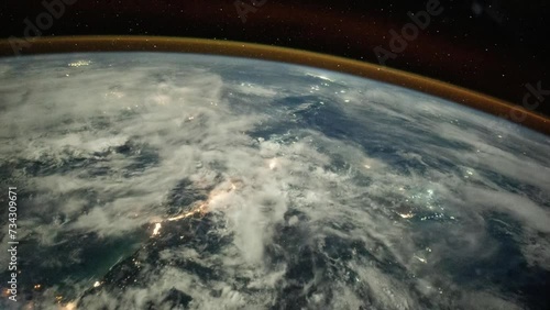 Nocturnal flight over Indonesia. As seen from the International Space Station. Elements of this image furnished by NASA. Corrected for flickering.