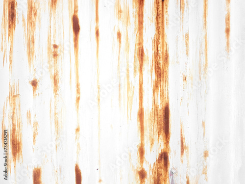 Rusted metal background with streaks of rust.