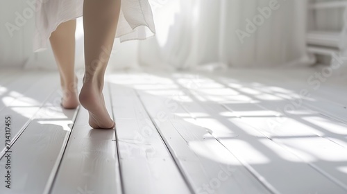 Generative AI : Barefoot woman walking on white parquet at home, closeup. Heated floor