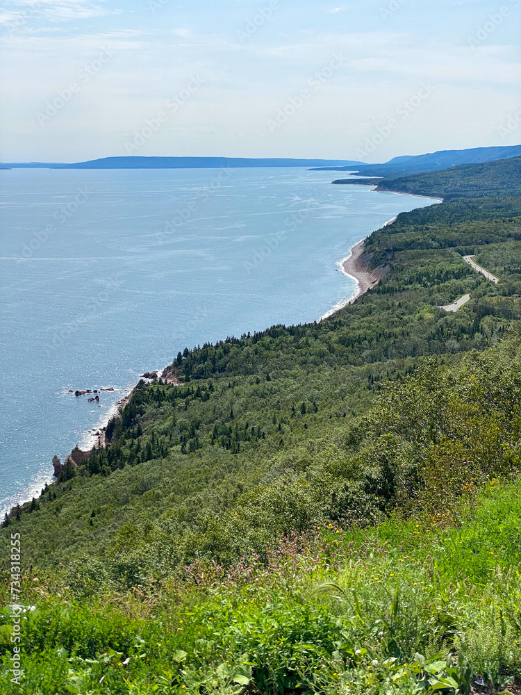 Obraz premium The Cabot Trail, a scenic highway on Cape Breton Island in Nova Scotia, Canada. Rugged coastline in the Cape Breton Highlands and the Cape Breton Highlands National Park.