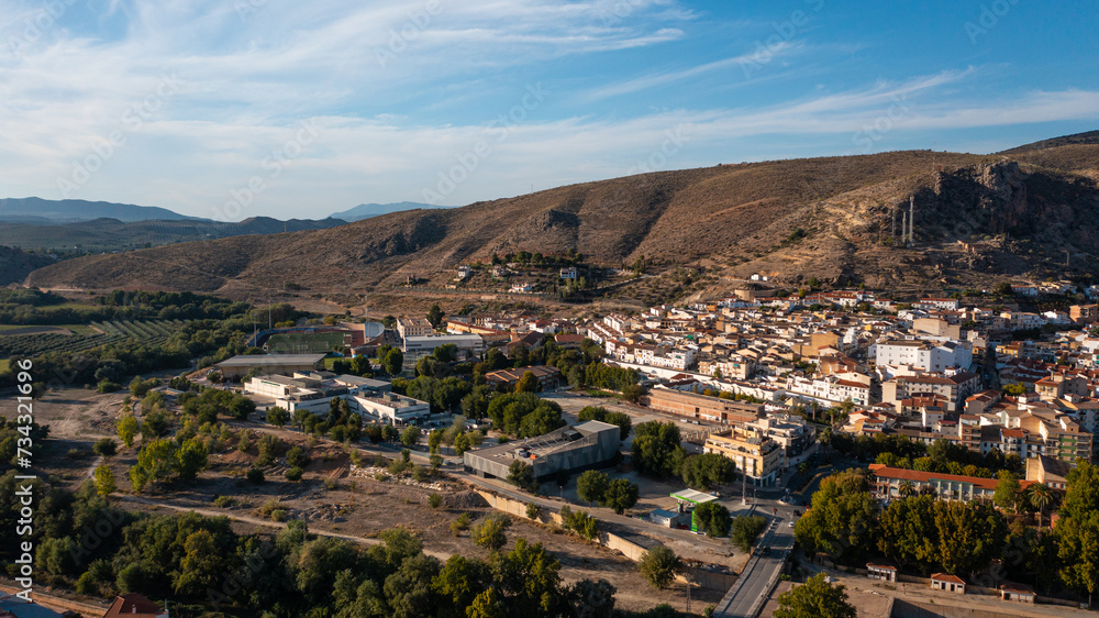 Aerial photo from drone to city of Loja and Church of the Incarnation with Moorish Alcazaba and Gorda Peak .Loja ,Granada, Andalusia, Spain, Europe (Series)