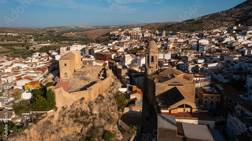 Aerial photo from drone to city of Loja and Church of the Incarnation with Moorish Alcazaba and Gorda Peak .Loja ,Granada, Andalusia, Spain, Europe (Series)