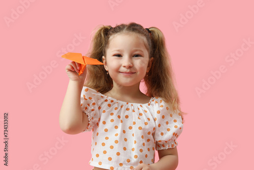 Cute little girl with paper...