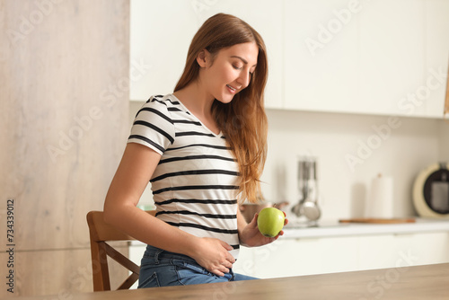 Young pregnant woman with a...