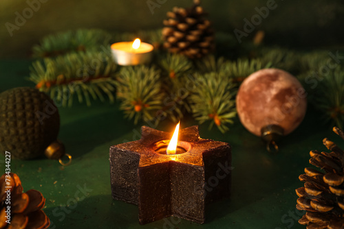 Star-shaped black candle wi...