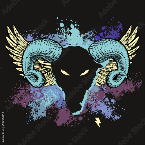 Obraz na plátne T-shirt design of a goat head with horns and wings on colored spots on a black background