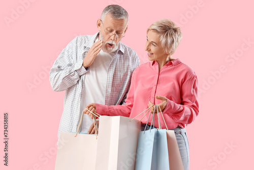 Mature woman with shopping ...