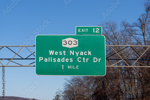 sign on I-287 I-87 NY State Thruway in West Nyack, New York for Exit 12 for NY-303 Palisades Center Drive and West Nyack
