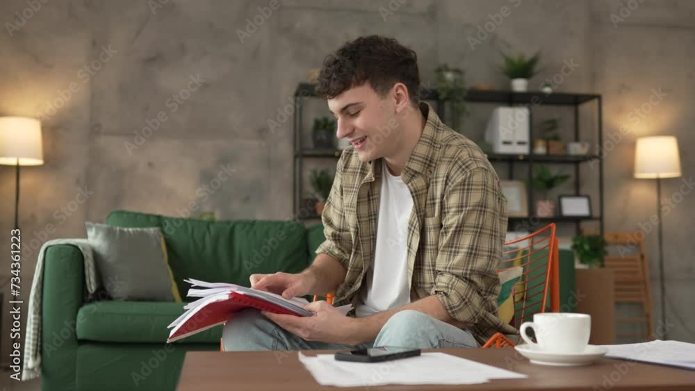 young caucasian man student study at home learn exam or prepare lesson young caucasian man student study at home learn exam or prepare lesson