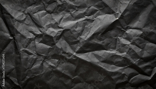 Black crumpled paper texture background. Copy space for your text