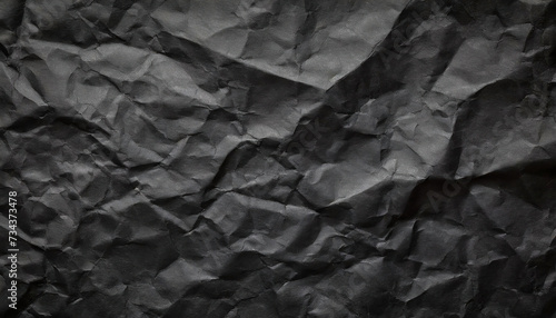 Black crumpled paper texture background. Copy space for your text