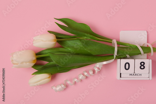 Fototapeta Naklejka Na Ścianę i Meble -  Calendar with date 8 MARCH and beautiful white tulips on pink background. International Women's Day