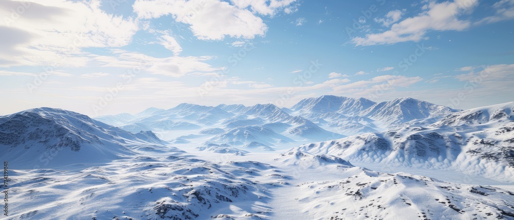 Majestic Snow-Covered Mountains Against Clear Blue Sky