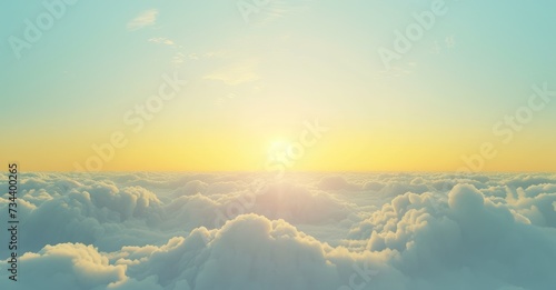 Peaceful Sunrise Over Fluffy Clouds Horizon photo