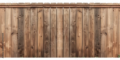 Brown wooden fence isolated on a white background that separates the objects.  © Jasper W