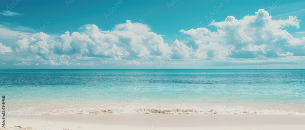 Serene Tropical Beach with Turquoise Water and Fluffy Clouds
