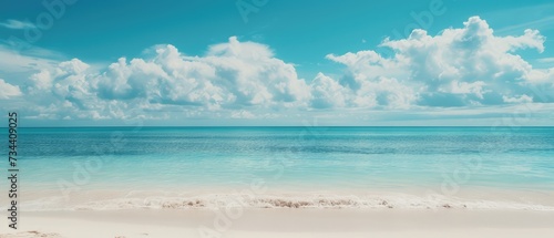 Serene Tropical Beach with Turquoise Water and Fluffy Clouds © evening_tao